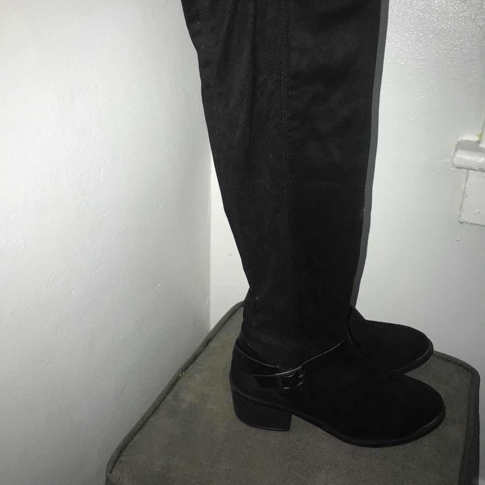 Over the knee black boots